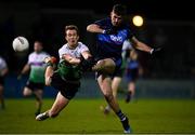 6 November 2021; Brian Coakley of St Jude's in action against Ciaran Smith of Lucan Sarsfields during the Go Ahead Dublin County Senior Club Football Championship Semi-Final match between St Jude's and Lucan Sarsfields at Parnell Park in Dublin. Photo by Sam Barnes/Sportsfile