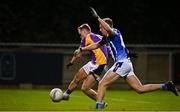 6 November 2021; Shane Cunningham of Kilmacud Crokes shoots to score his side's first goal, despite the efforts of Kieran Kennedy of Ballyboden St Enda's during the Go Ahead Dublin County Senior Club Football Championship Semi-Final match between Kilmacud Crokes and Ballyboden St Enda's at Parnell Park in Dublin. Photo by Sam Barnes/Sportsfile