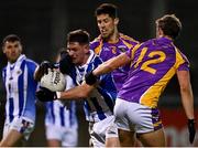 6 November 2021; James Holland of Ballyboden St Enda's in action against Shane Horan, right, and Rory O'Carroll of Kilmacud Crokes during the Go Ahead Dublin County Senior Club Football Championship Semi-Final match between Kilmacud Crokes and Ballyboden St Enda's at Parnell Park in Dublin. Photo by Sam Barnes/Sportsfile