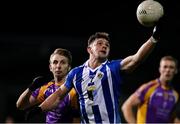 6 November 2021; James Holland of Ballyboden St Enda's in action against Ross McGowan of Kilmacud Crokes during the Go Ahead Dublin County Senior Club Football Championship Semi-Final match between Kilmacud Crokes and Ballyboden St Enda's at Parnell Park in Dublin. Photo by Sam Barnes/Sportsfile