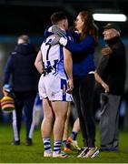 6 November 2021; James Holland of Ballyboden St Enda's is consoled by friends and family after his side's defeast in the Go Ahead Dublin County Senior Club Football Championship Semi-Final match between Kilmacud Crokes and Ballyboden St Enda's at Parnell Park in Dublin. Photo by Sam Barnes/Sportsfile
