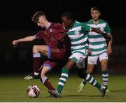 6 November 2021; Eoin Hannon of Galway United in action against Aji Oluwabiyi of Shamrock Rovers during the EA SPORTS National League of Ireland U14 League Final match between Shamrock Rovers and Galway United at Athlone Town Stadium in Athlone, Westmeath. Photo by Michael P Ryan/Sportsfile