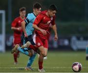 6 November 2021; Sean Cummins of Shelbourne in action against Louis Allman of Cobh Ramblers during the EA SPORTS U17 National League of Ireland Shield Final match between Shelbourne and Cobh Ramblers at Athlone Town Stadium in Athlone, Westmeath. Photo by Michael P Ryan/Sportsfile