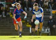 7 November 2021; Anna Wogan of Seneschalstown in action against Honor Hickey of St Peter's Dunboyne during the Meath County Ladies Football Senior Club Championship Final match between St Peter's Dunboyne and Seneschalstown at Páirc Tailteann in Navan, Meath. Photo by Seb Daly/Sportsfile