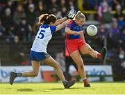 7 November 2021; Vikki Wall of St Peter's Dunboyne kicks a point under pressure from Roisin Commons of Seneschalstown during the Meath County Ladies Football Senior Club Championship Final match between St Peter's Dunboyne and Seneschalstown at Páirc Tailteann in Navan, Meath. Photo by Seb Daly/Sportsfile