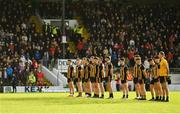 7 November 2021; St Peter's Dunboyne players stand for a minutes silence before the Meath County Senior Club Football Championship Final match between St Peter's Dunboyne and Wolfe Tones at Páirc Tailteann in Navan, Meath. Photo by Seb Daly/Sportsfile