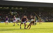 7 November 2021; David McEntee of St Peter's Dunboyne in action against Shane Glynn of Wolfe Tones during the Meath County Senior Club Football Championship Final match between St Peter's Dunboyne and Wolfe Tones at Páirc Tailteann in Navan, Meath. Photo by Seb Daly/Sportsfile