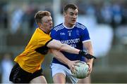 7 November 2021; Leo McLoone of Naomh Conaill in action against Kevin Kealy of St Eunan's during the Donegal County Senior Club Football Championship Final match between St Eunan's and Naomh Conaill at MacCumhaill Park in Ballybofey, Donegal. Photo by Ramsey Cardy/Sportsfile