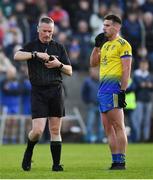 7 November 2021; Match referee Derek Ryan prepares to issue a 'black card' to Danny Kindlon of St Mochta’s during the Louth County Senior Club Football Championship Final match between Naomh Mairtin and St Mochta’s at Páirc Mhuire in Ardee, Louth. Photo by Ray McManus/Sportsfile