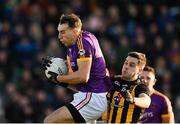 7 November 2021; Shane Glynn of Wolfe Tones in action against Liam Byrne of St Peter's Dunboyne during the Meath County Senior Club Football Championship Final match between St Peter's Dunboyne and Wolfe Tones at Páirc Tailteann in Navan, Meath. Photo by Seb Daly/Sportsfile