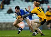 7 November 2021; Kevin McGettigan of Naomh Conaill in action against Eoin McGeehin of St Eunan's during the Donegal County Senior Club Football Championship Final match between St Eunan's and Naomh Conaill at MacCumhaill Park in Ballybofey, Donegal. Photo by Ramsey Cardy/Sportsfile