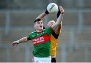 7 November 2021; Laurence Caffrey of Ramor United in action against Ryan Brady of Gowna during the Cavan County Senior Club Football Championship Final match between Gowna and Ramor United at Kingspan Breffni in Cavan. Photo by Oliver McVeigh/Sportsfile