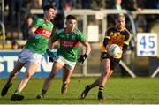 7 November 2021; Sean McEvoy of Ramor United in action against Conor Casey and Cormac Brady of Gowna during the Cavan County Senior Club Football Championship Final match between Gowna and Ramor United at Kingspan Breffni in Cavan. Photo by Oliver McVeigh/Sportsfile