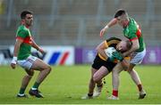 7 November 2021; Laurence Caffrey of Ramor United in action against Ryan Brady of Gowna during the Cavan County Senior Club Football Championship Final match between Gowna and Ramor United at Kingspan Breffni in Cavan. Photo by Oliver McVeigh/Sportsfile