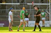 7 November 2021; Danny Loughnane of O'Loughlin Gaels, left, is shown a red card by referee Owen Beehan during the Kilkenny County Senior Club Hurling Championship Final match between Ballyhale Shamrocks and O'Loughlin Gaels at UPMC Nowlan Park in Kilkenny. Photo by Brendan Moran/Sportsfile