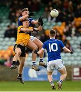 7 November 2021; Charles McGuinness of Naomh Conaill in action against Peter McEniff of St Eunan's during the Donegal County Senior Club Football Championship Final match between St Eunan's and Naomh Conaill at MacCumhaill Park in Ballybofey, Donegal. Photo by Ramsey Cardy/Sportsfile
