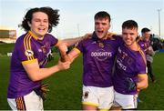 7 November 2021; Wolfe Tones players, from left, Oisín Martin, Sarán Ó Fionnagáin and Brughach Ó Fionnagáin celebrate after their side's victory in the Meath County Senior Club Football Championship Final match between St Peter's Dunboyne and Wolfe Tones at Páirc Tailteann in Navan, Meath. Photo by Seb Daly/Sportsfile