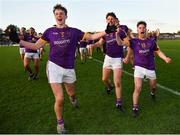 7 November 2021; Wolfe Tones players, from left, Adam O’Neill, Cian O’Neill and Gearóid O’Brien celebrate after their side's victory in the Meath County Senior Club Football Championship Final match between St Peter's Dunboyne and Wolfe Tones at Páirc Tailteann in Navan, Meath. Photo by Seb Daly/Sportsfile