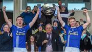 7 November 2021; Shane Carey and Kieran Hughes of Scotstown lifts the Mick Duffy cup after the Monaghan County Senior Club Football Championship Final match between Scotstown and Truagh at St Tiernachs Park in Clones, Monaghan. Photo by Philip Fitzpatrick/Sportsfile
