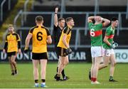 7 November 2021; Referee Pat Clarke issues a late black card to Enda Maguire of Ramor United during the Cavan County Senior Club Football Championship Final match between Gowna and Ramor United at Kingspan Breffni in Cavan. Photo by Oliver McVeigh/Sportsfile