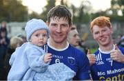 7 November 2021; Darren Hughes of Scotstown with his six month old son Cillian after the Monaghan County Senior Club Football Championship Final match between Scotstown and Truagh at St Tiernachs Park in Clones, Monaghan. Photo by Philip Fitzpatrick/Sportsfile