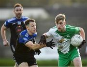 7 November 2021; Adam McHugh of Baltinglass in action against Jack Gilligan of Blessington during the Wicklow County Senior Club Football Championship Final match between Baltinglass and Blessington at County Grounds in Aughrim, Wicklow. Photo by David Fitzgerald/Sportsfile