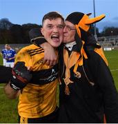 7 November 2021; St Eunan's captain Niall O'Donnell celebrates with St Eunan's supporter Brian Kelly after the Donegal County Senior Club Football Championship Final match between St Eunan's and Naomh Conaill at MacCumhaill Park in Ballybofey, Donegal. Photo by Ramsey Cardy/Sportsfile