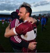 7 November 2021; Dónal McElligott of Mullinalaghta St Columbas celebrates with a supporter after the Longford County Senior Club Football Championship Final match between Mostrim and Mullinalaghta St Columba's at Glennon Brothers Pearse Park in Longford. Photo by Eóin Noonan/Sportsfile