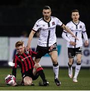 7 November 2021; Michael Duffy of Dundalk in action against Aodh Dervin of Longford Town during the SSE Airtricity League Premier Division match between Dundalk and Longford Town at Oriel Park in Dundalk, Louth. Photo by Michael P Ryan/Sportsfile