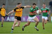 7 November 2021; Conor Madden of Gowna in action against Jack Brady of Ramor United during the Cavan County Senior Club Football Championship Final match between Gowna and Ramor United at Kingspan Breffni in Cavan. Photo by Oliver McVeigh/Sportsfile