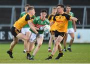 7 November 2021; Conor Casey of Gowna in action against Enda Maguire and Cathal Maguire of Ramor United during the Cavan County Senior Club Football Championship Final match between Gowna and Ramor United at Kingspan Breffni in Cavan. Photo by Oliver McVeigh/Sportsfile