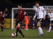 7 November 2021; Aaron Robinson of Longford Town in action against Will Patching of Dundalk during the SSE Airtricity League Premier Division match between Dundalk and Longford Town at Oriel Park in Dundalk, Louth. Photo by Michael P Ryan/Sportsfile