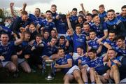 7 November 2021; Naomh Mairtin captain Sam Mulroy, 14, and team-mates celebrate with the Joe Ward Cup after the Louth County Senior Club Football Championship Final match between Naomh Mairtin and St Mochta’s at Páirc Mhuire in Ardee, Louth. Photo by Ray McManus/Sportsfile