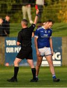7 November 2021; Match referee Derek Ryan shows a red card to Mick Fanning of Naomh Mairtin just before the final whistle of the Louth County Senior Club Football Championship Final match between Naomh Mairtin and St Mochta’s at Páirc Mhuire in Ardee, Louth. Photo by Ray McManus/Sportsfile