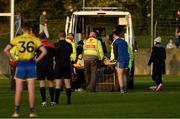 7 November 2021; Referee, players and officials look on as Stephen McCooey of St Mochta’s is removed by ambulance in the last few minutes of the Louth County Senior Club Football Championship Final match between Naomh Mairtin and St Mochta’s at Páirc Mhuire in Ardee, Louth. Photo by Ray McManus/Sportsfile