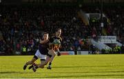 7 November 2021; Conor Bradley of St Peter's Dunboyne in action against Shane Glynn of Wolfe Tones during the Meath County Senior Club Football Championship Final match between St Peter's Dunboyne and Wolfe Tones at Páirc Tailteann in Navan, Meath. Photo by Seb Daly/Sportsfile