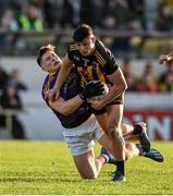 7 November 2021; Gavin McCoy of St Peter's Dunboyne in action against Thomas O’Reilly of Wolfe Tones during the Meath County Senior Club Football Championship Final match between St Peter's Dunboyne and Wolfe Tones at Páirc Tailteann in Navan, Meath. Photo by Seb Daly/Sportsfile