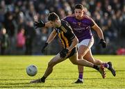 7 November 2021; Liam Byrne of St Peter's Dunboyne in action against Pádraic Diamond of Wolfe Tones during the Meath County Senior Club Football Championship Final match between St Peter's Dunboyne and Wolfe Tones at Páirc Tailteann in Navan, Meath. Photo by Seb Daly/Sportsfile