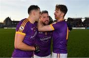 7 November 2021; Wolfe Tones players, from left, Shane Glynn, Cian Ward and Cian O’Neill celebrate after their side's victory in the Meath County Senior Club Football Championship Final match between St Peter's Dunboyne and Wolfe Tones at Páirc Tailteann in Navan, Meath. Photo by Seb Daly/Sportsfile