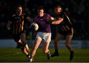 7 November 2021; Niall O’Reilly of Wolfe Tones in action against Ronan Jones, left, and Michael Murphy of St Peter's Dunboyne during the Meath County Senior Club Football Championship Final match between St Peter's Dunboyne and Wolfe Tones at Páirc Tailteann in Navan, Meath. Photo by Seb Daly/Sportsfile