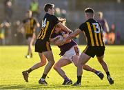7 November 2021; Oisín Martin of Wolfe Tones in action against Conor Bradley, left, and Gavin McCoy of St Peter's Dunboyne during the Meath County Senior Club Football Championship Final match between St Peter's Dunboyne and Wolfe Tones at Páirc Tailteann in Navan, Meath. Photo by Seb Daly/Sportsfile