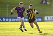 7 November 2021; David McEntee of St Peter's Dunboyne in action against Niall O’Reilly of Wolfe Tones during the Meath County Senior Club Football Championship Final match between St Peter's Dunboyne and Wolfe Tones at Páirc Tailteann in Navan, Meath. Photo by Seb Daly/Sportsfile