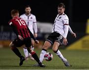 7 November 2021; Will Patching of Dundalk in action against Aodh Dervin of Longford Town during the SSE Airtricity League Premier Division match between Dundalk and Longford Town at Oriel Park in Dundalk, Louth. Photo by Michael P Ryan/Sportsfile