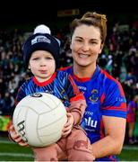 7 November 2021; Aoife Thompson of St Peter's Dunboyne with her son Padraig Foran, age 2, after the Meath County Ladies Football Senior Club Championship Final match between St Peter's Dunboyne and Seneschalstown at Páirc Tailteann in Navan, Meath. Photo by Seb Daly/Sportsfile
