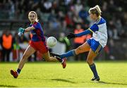 7 November 2021; Mena Sheridan of Seneschalstown kicks a point under pressure from Alison Jones of St Peter's Dunboyne during the Meath County Ladies Football Senior Club Championship Final match between St Peter's Dunboyne and Seneschalstown at Páirc Tailteann in Navan, Meath. Photo by Seb Daly/Sportsfile