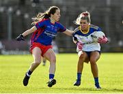 7 November 2021; Kiah Geraghty of Seneschalstown in action against Annie Moffatt of St Peter's Dunboyne during the Meath County Ladies Football Senior Club Championship Final match between St Peter's Dunboyne and Seneschalstown at Páirc Tailteann in Navan, Meath. Photo by Seb Daly/Sportsfile