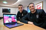 9 November 2021; Republic of Ireland players Seamus Coleman and Matt Doherty, right, speak to Liam Roche, age 15, from Cross, Co Clare, who is attending Children's Health Ireland at Temple Street, during a virtual Christmas visit to Children's Health Ireland at Crumlin & Temple Street from their team hotel, Castleknock Hotel in Dublin. Photo by Stephen McCarthy/Sportsfile