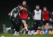 10 November 2021; Matt Doherty, left, and Troy Parrott, centre, during a Republic of Ireland training session at the Aviva Stadium in Dublin. Photo by Stephen McCarthy/Sportsfile