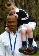 16 January 2003; New Zealand rugby international Jonah Lomu with four-year-old Dan Sheehan at the launch of the Ballygowan one litre Sports Pack in St. Stephen's Green, Dublin. Photo by Pat Murphy/Sportsfile