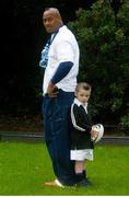 16 January 2003; New Zealand rugby international Jonah Lomu with four-year-old Dan Sheehan at the launch of the Ballygowan one litre Sports Pack in St. Stephen's Green, Dublin. Photo by Pat Murphy/Sportsfile